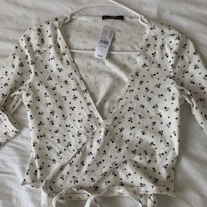 SOLD brandy melville floral wrap top